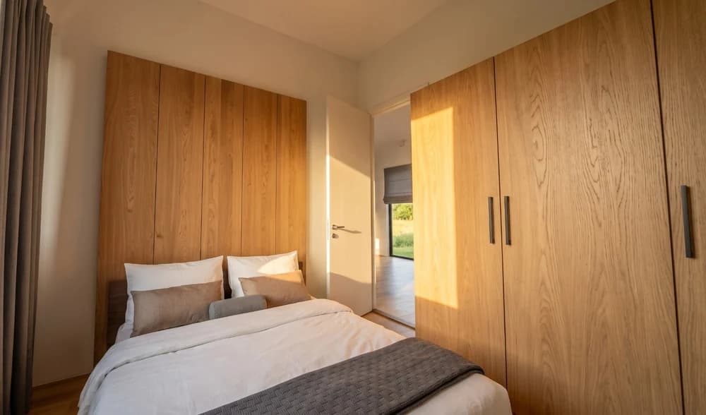 The same bedroom rendered as a photograph