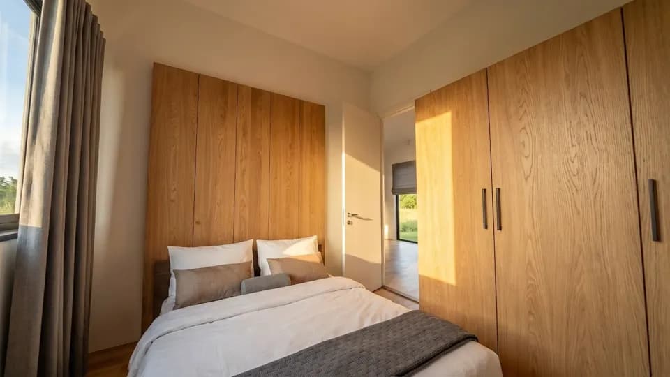 A guest bedroom shot with a camera move